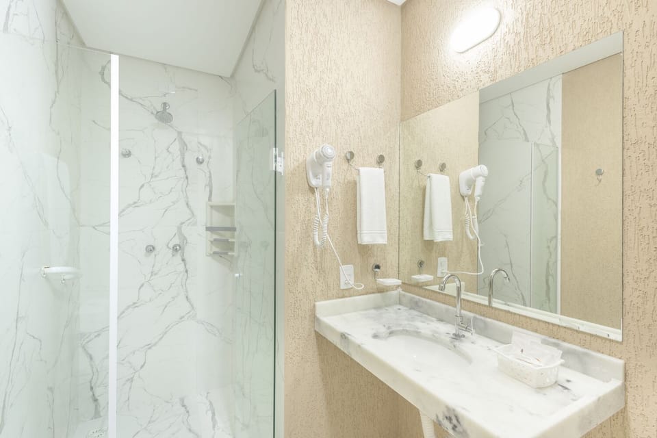Shower, free toiletries, hair dryer, towels