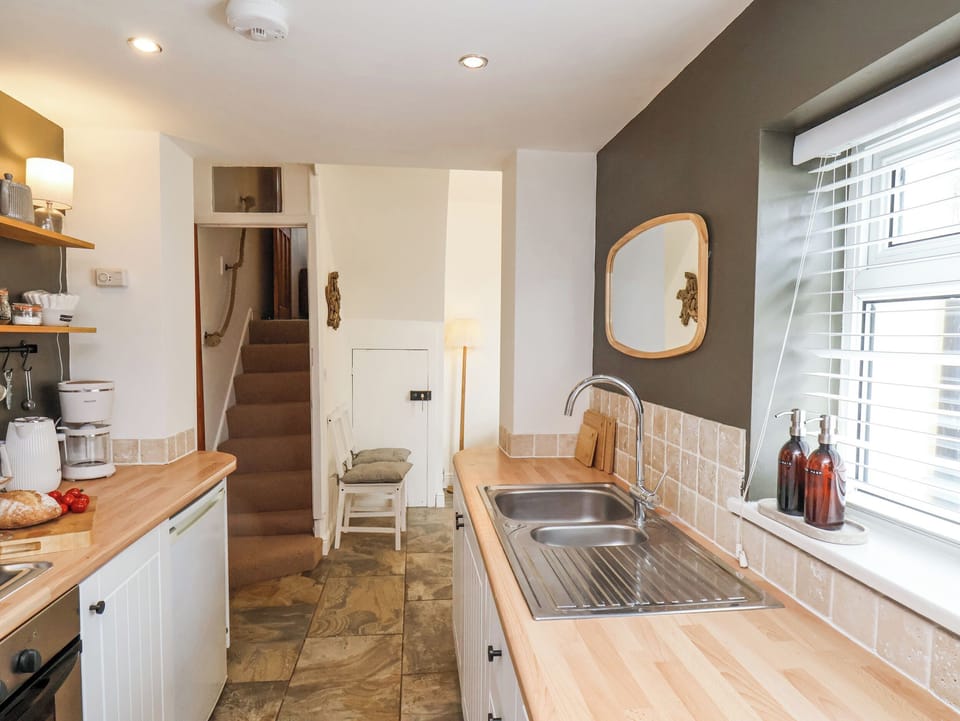 Fridge, microwave, toaster, cookware/dishes/utensils