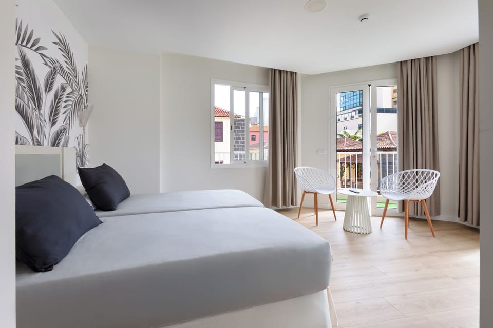 Standard Twin Room, Balcony, City View | Laptop workspace, blackout drapes, free WiFi, bed sheets
