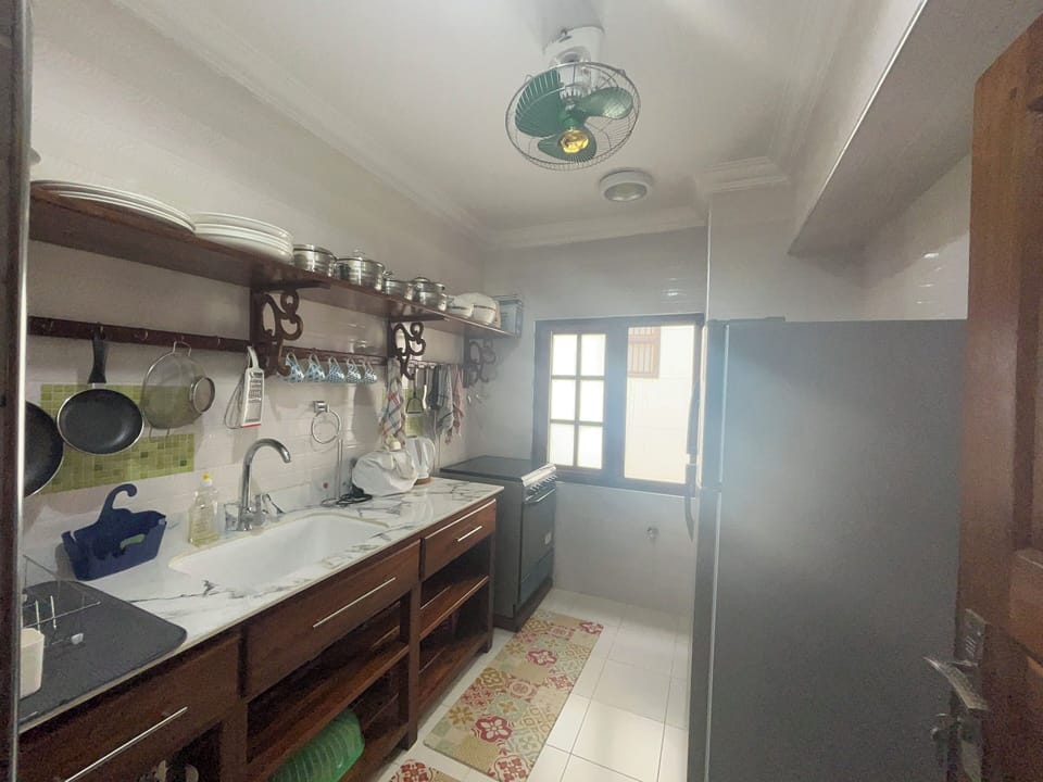 Deluxe Condo, Balcony, City View | Private kitchen | Full-size fridge, microwave, stovetop, cookware/dishes/utensils