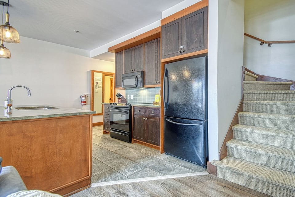 1520 Versant Soleil, Unit 12 | Private kitchen | Full-size fridge, microwave, oven, stovetop