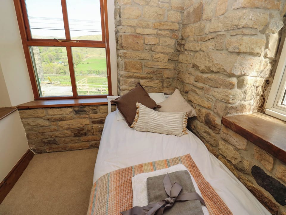 Pule Hill Farm Cottage in Oldham District