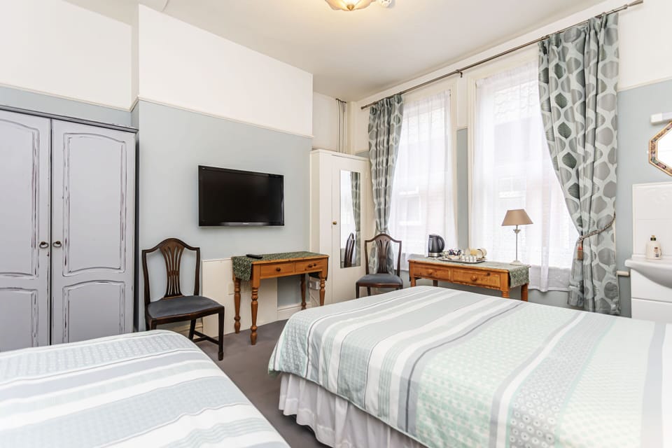 Standard Triple Room, Shared Bathroom | Free WiFi, bed sheets