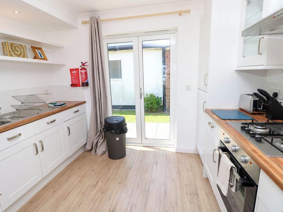 Fridge, microwave, toaster, cookware/dishes/utensils