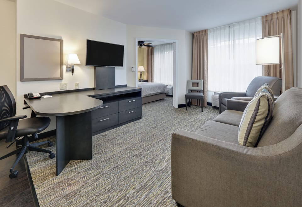Suite, 1 Bedroom | In-room safe, desk, blackout drapes, iron/ironing board