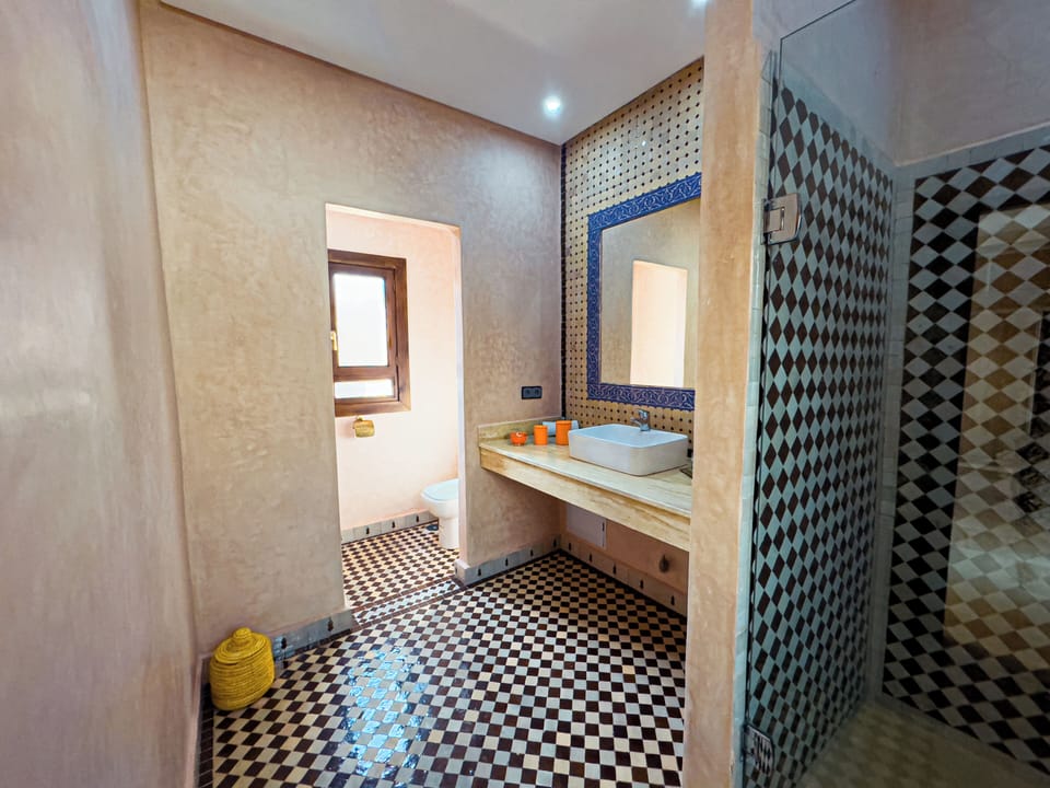 Luxury Suite, Courtyard View | Bathroom | Bathrobes, bidet