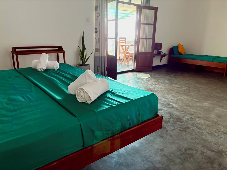 Triple Room, Balcony, Sea View | Individually decorated, individually furnished, desk, laptop workspace