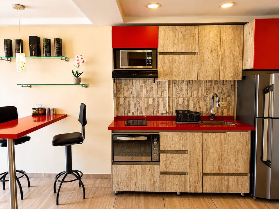 Apartment | Private kitchen | Full-size fridge, microwave, stovetop, rice cooker