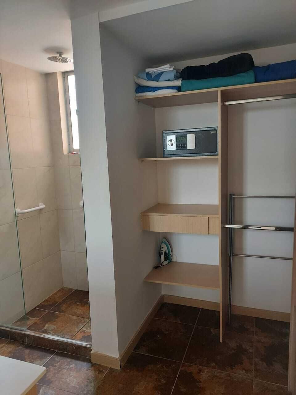 Shower, towels, soap, toilet paper