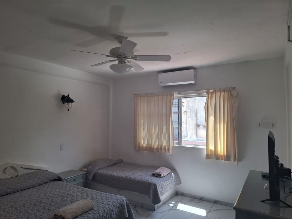 Basic Double Room | Bathroom | Towels, soap, shampoo, toilet paper