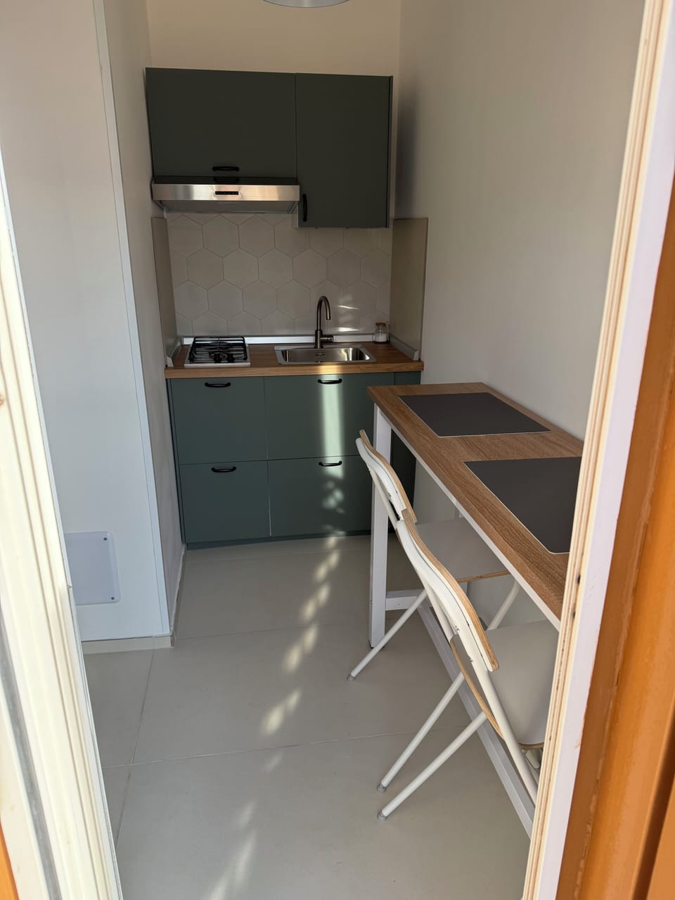 Family Triple Room, Balcony, Partial Sea View | Private kitchen | Full-size fridge, microwave, espresso maker, electric kettle