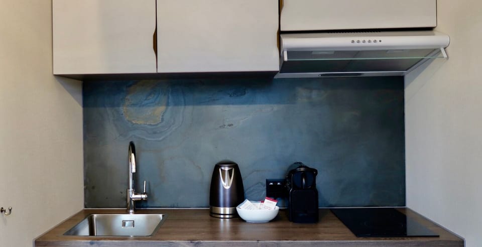 Superior Suite, Overwater | Private kitchen | Microwave, stovetop, cookware/dishes/utensils