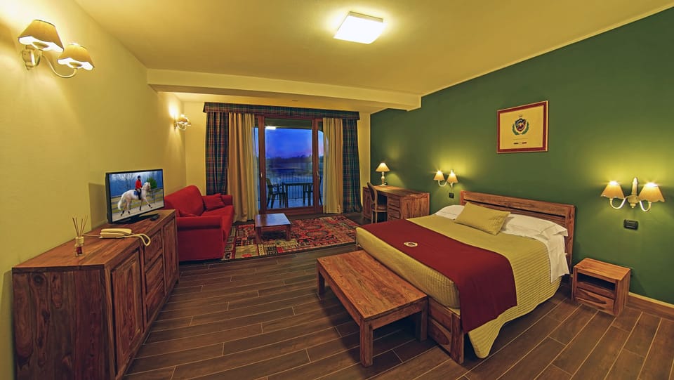 Triple Room, Balcony | Minibar, in-room safe, desk, free WiFi