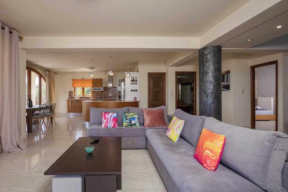 Apartment, Sea View | Living area | 60-inch Smart TV with cable channels, Netflix, streaming services