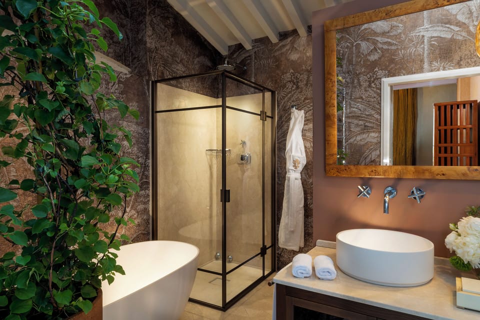 Master Suite | Bathroom | Hair dryer, slippers, bidet, towels
