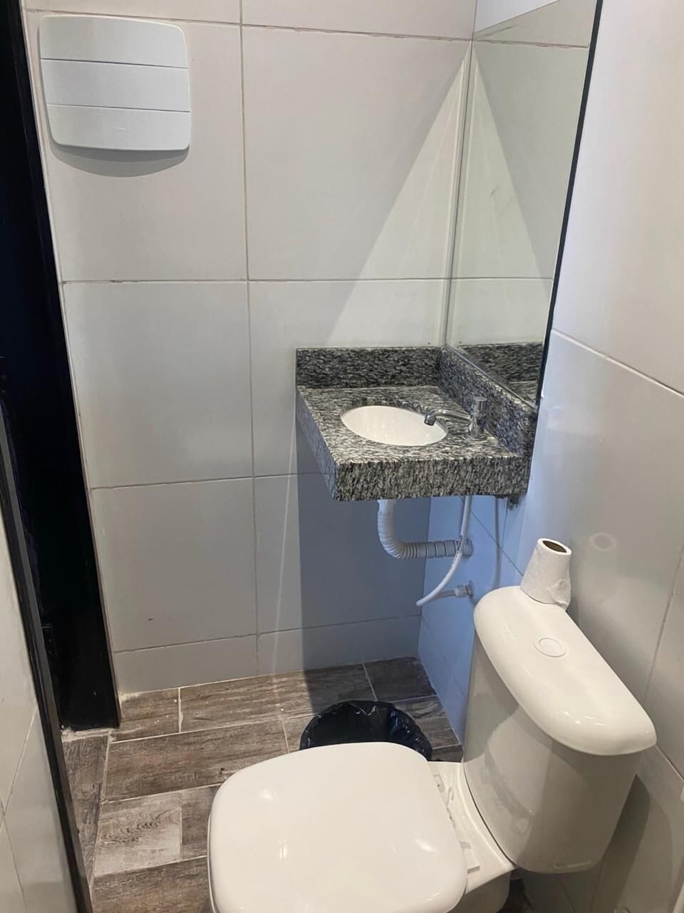 Shower, towels, toilet paper