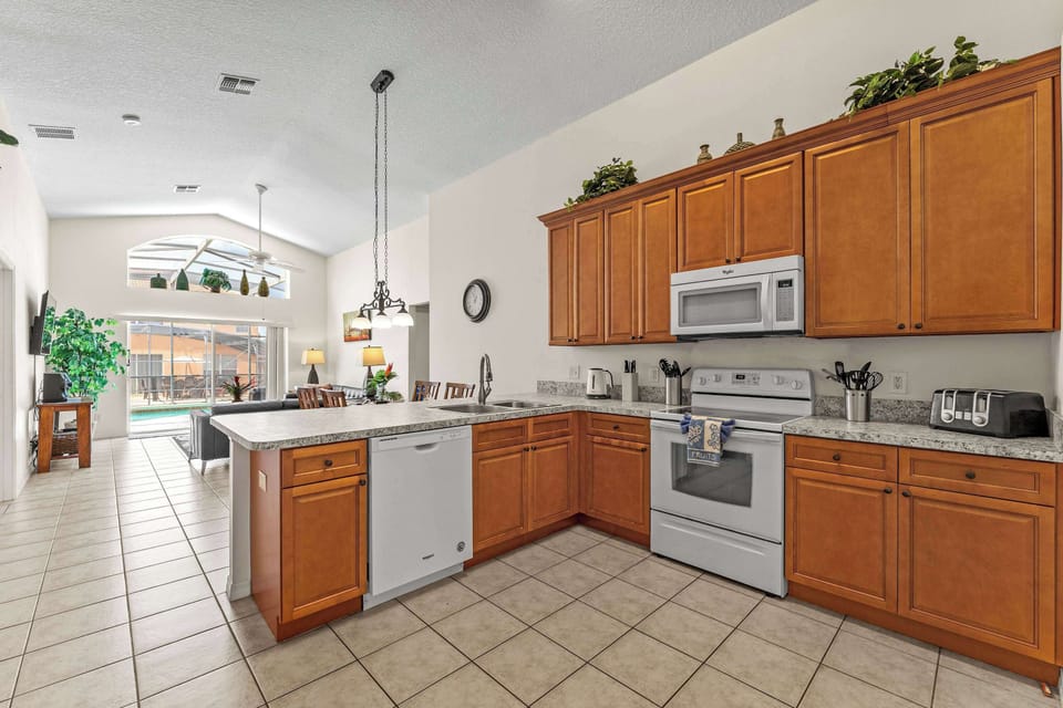 House, Multiple Beds, Pool Access, Pool View (Sunkist Getaway) | Private kitchen | Fridge, microwave, oven, stovetop