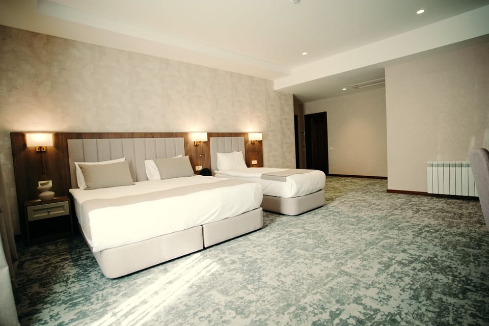 Standard Triple Room, Mountain View | Premium bedding, minibar, in-room safe, laptop workspace