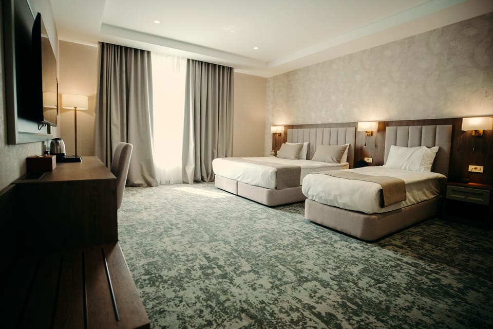 Standard Triple Room, Mountain View | Premium bedding, minibar, in-room safe, laptop workspace