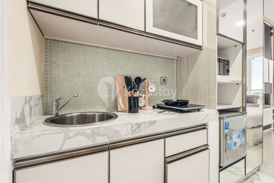 Apartment, 1 Bedroom, City View | Private kitchen | Mini-fridge, microwave, stovetop, cookware/dishes/utensils