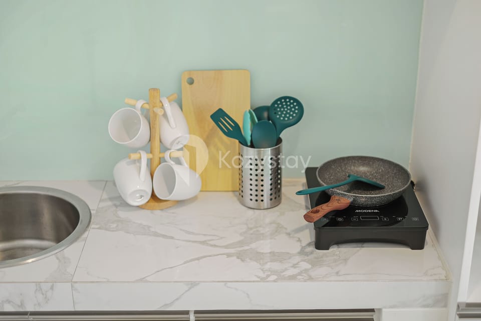 Mini-fridge, microwave, stovetop, cookware/dishes/utensils