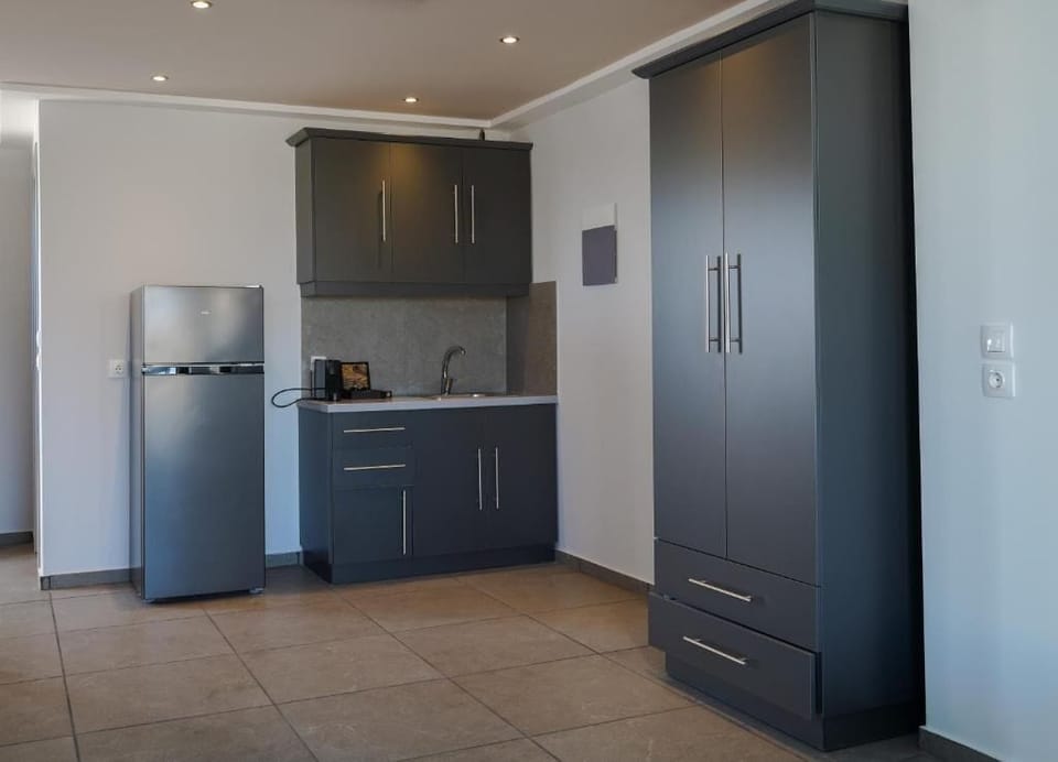 Loft Suite Caldera View with shared pool | Private kitchenette