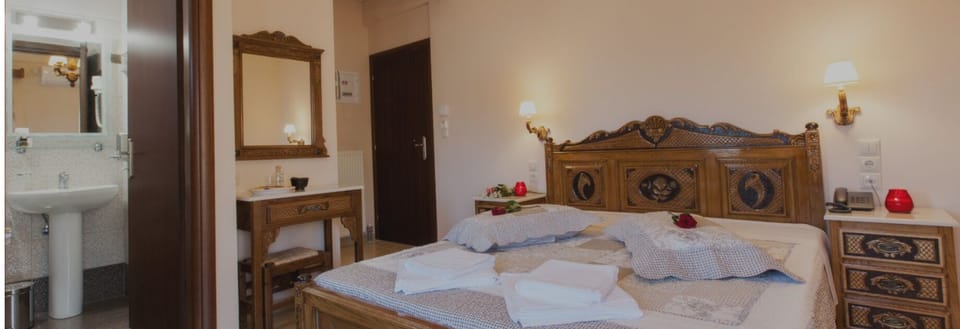 Deluxe Double Room, Courtyard View | In-room safe, soundproofing, iron/ironing board, free WiFi