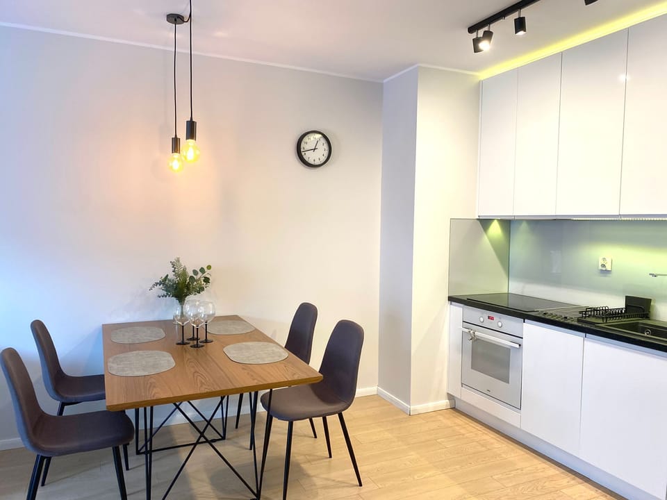 Comfort Apartment, Balcony | In-room dining