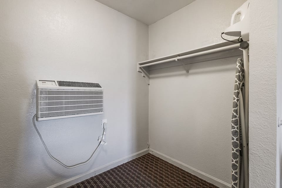 Room, 2 Queen Beds, Non Smoking | Desk, laptop workspace, blackout drapes, iron/ironing board