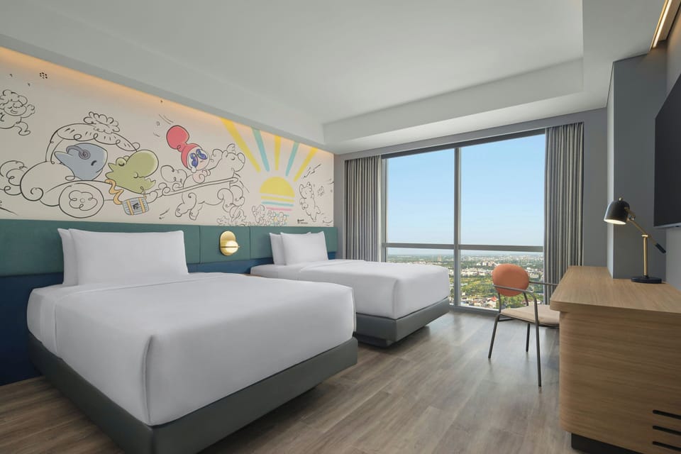 Deluxe Loft, 2 Twin Beds | In-room safe, desk, laptop workspace, blackout drapes