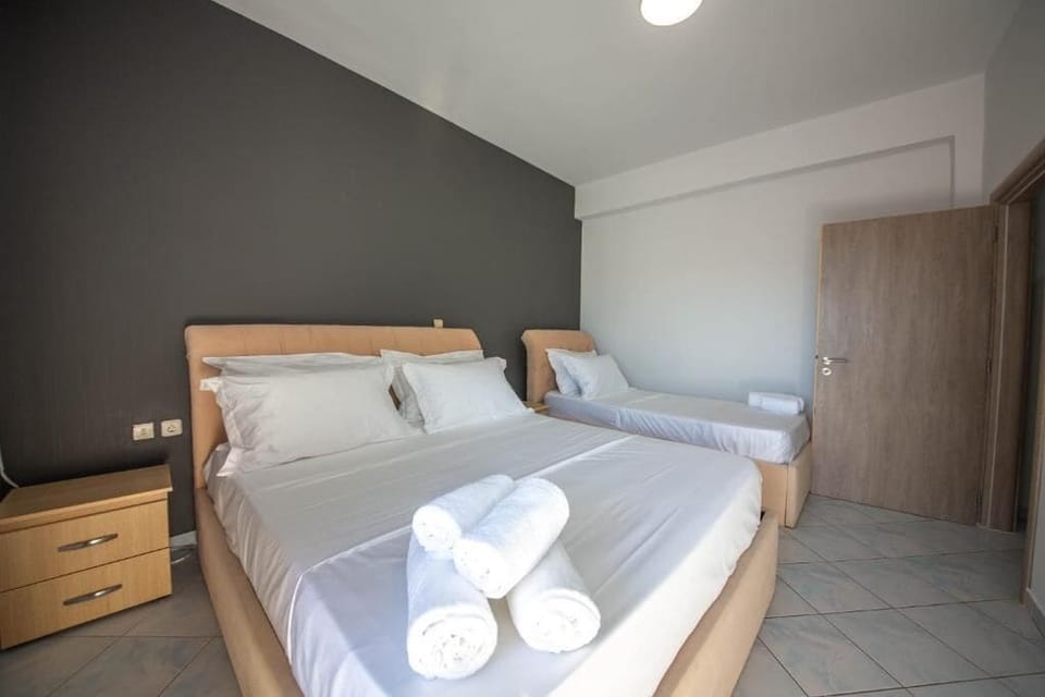 Two-Bedroom Family Room with Balcony and Sea View (4 Adults) | Free WiFi, bed sheets