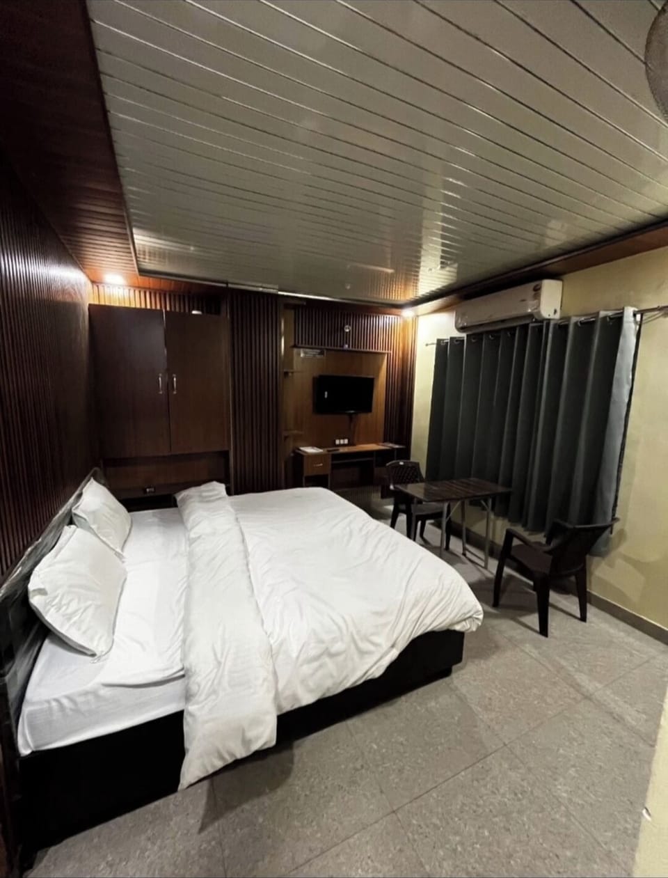 Deluxe Single Room, City View | In-room safe, desk, laptop workspace, blackout drapes