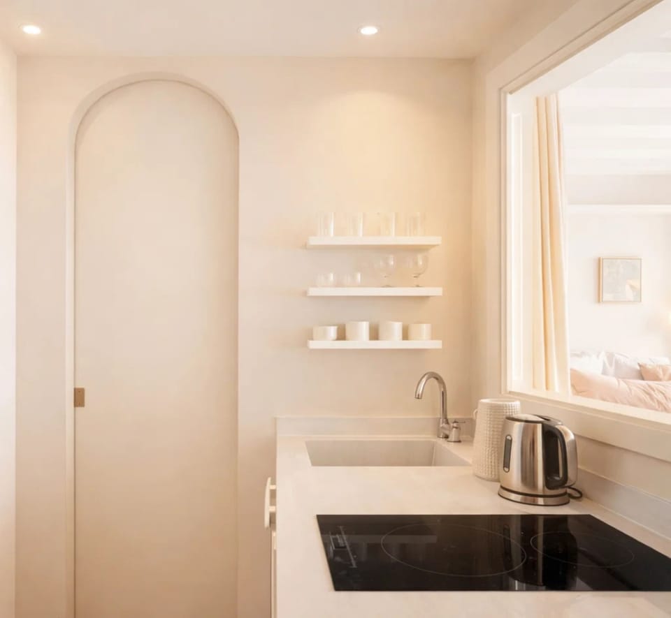 Deluxe Studio, Courtyard View | Private kitchen | Espresso maker, electric kettle, toaster, freezer
