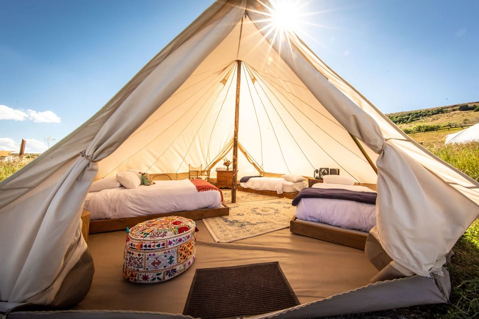 Traditional Tent with Electricity | Premium bedding, free cribs/infant beds, bed sheets