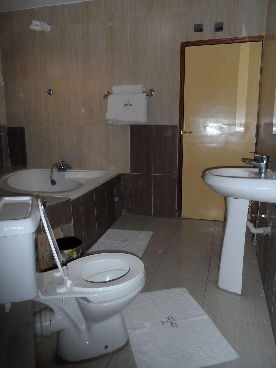 Double Room, City View | Bathroom | Shower, slippers, towels, soap
