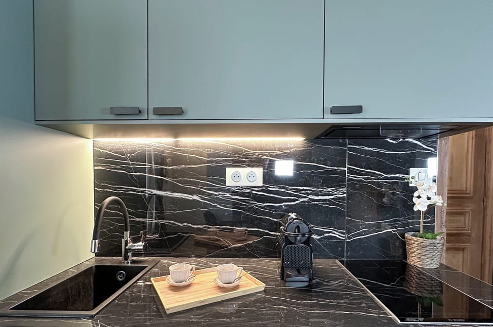 Deluxe Apartment, City View | Private kitchen | Full-size fridge, microwave, stovetop, espresso maker