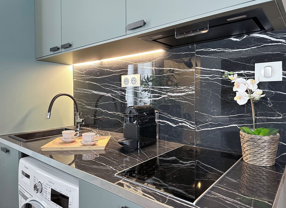 Deluxe Apartment, City View | Private kitchen | Full-size fridge, microwave, stovetop, espresso maker