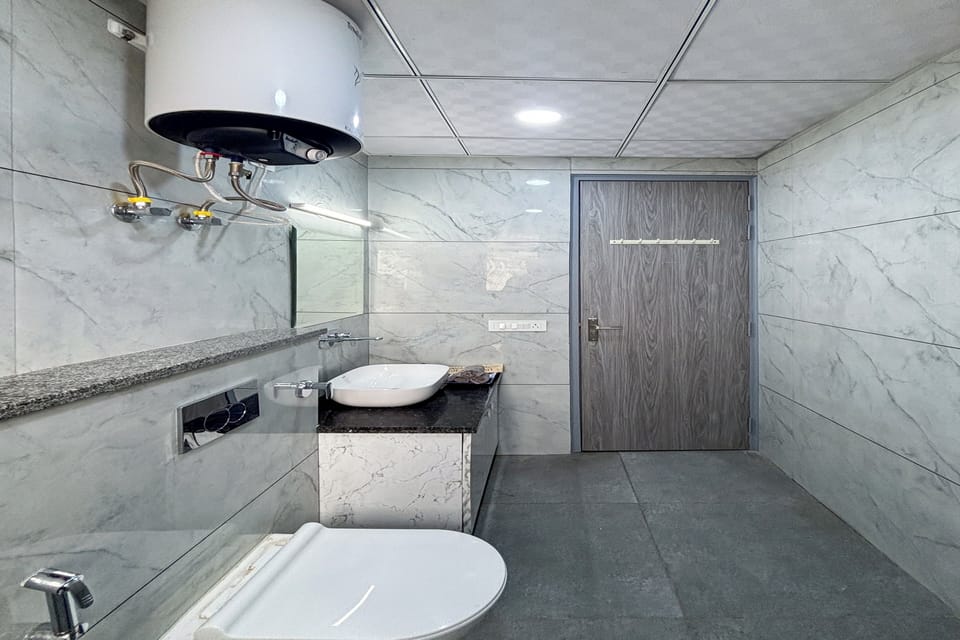 Studio, City View | Bathroom | Shower, free toiletries, slippers, bidet
