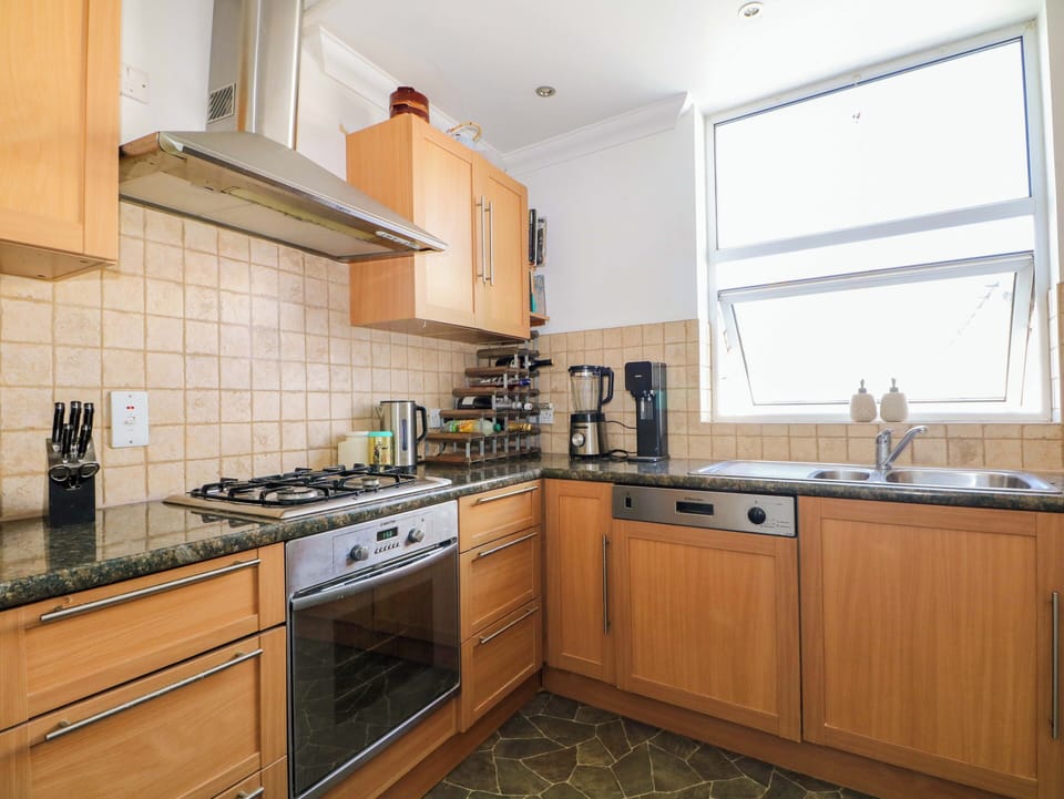 Fridge, dishwasher, toaster, cookware/dishes/utensils
