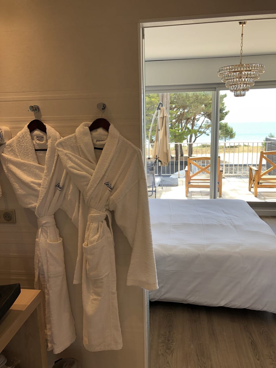 Deluxe Double Room, Terrace, Oceanfront | Minibar, in-room safe, soundproofing, iron/ironing board