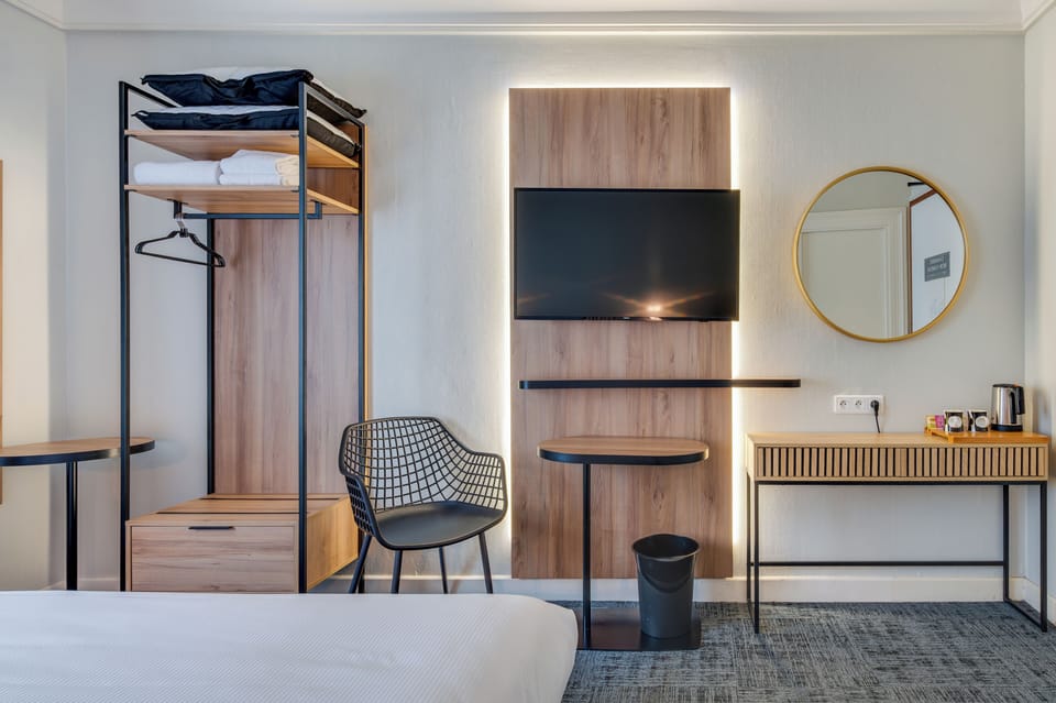 Select Comfort beds, desk, blackout drapes, soundproofing