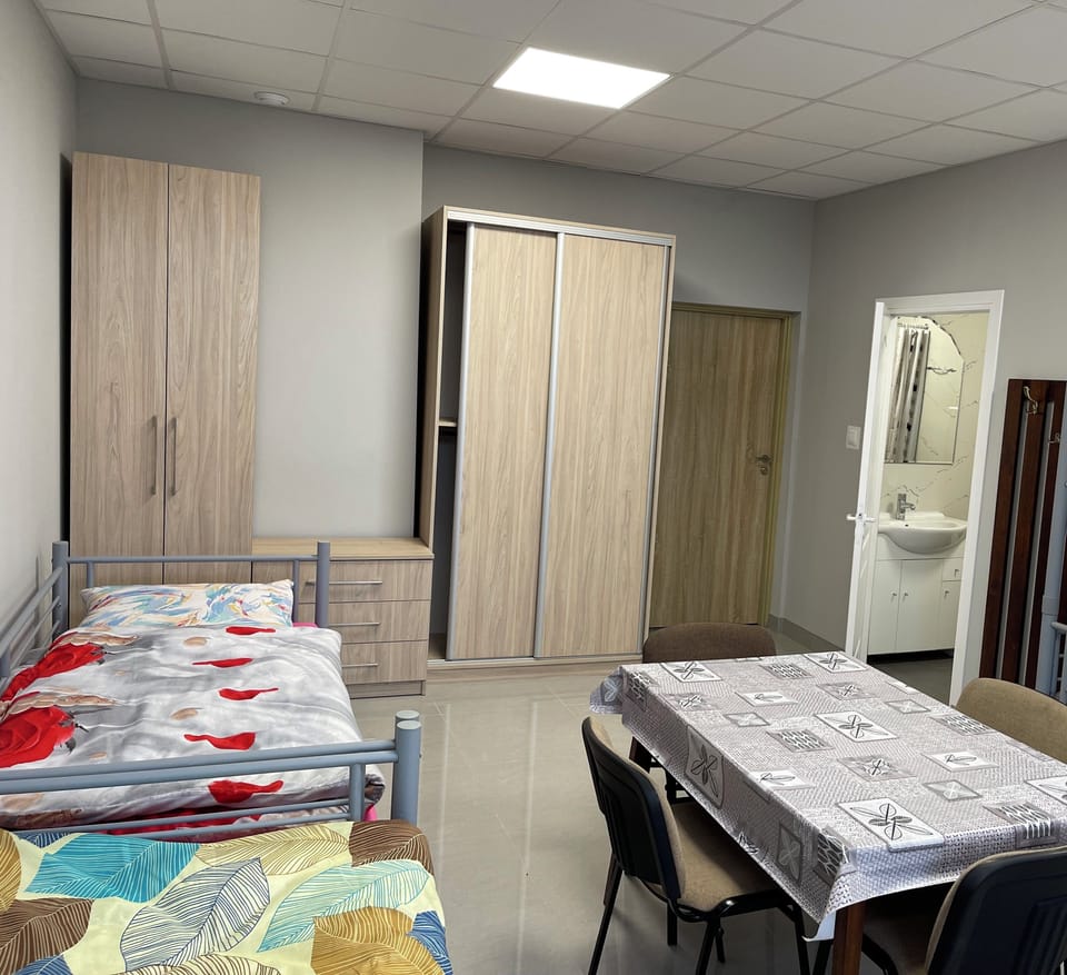 Triple Room, Garden View | Iron/ironing board, free WiFi