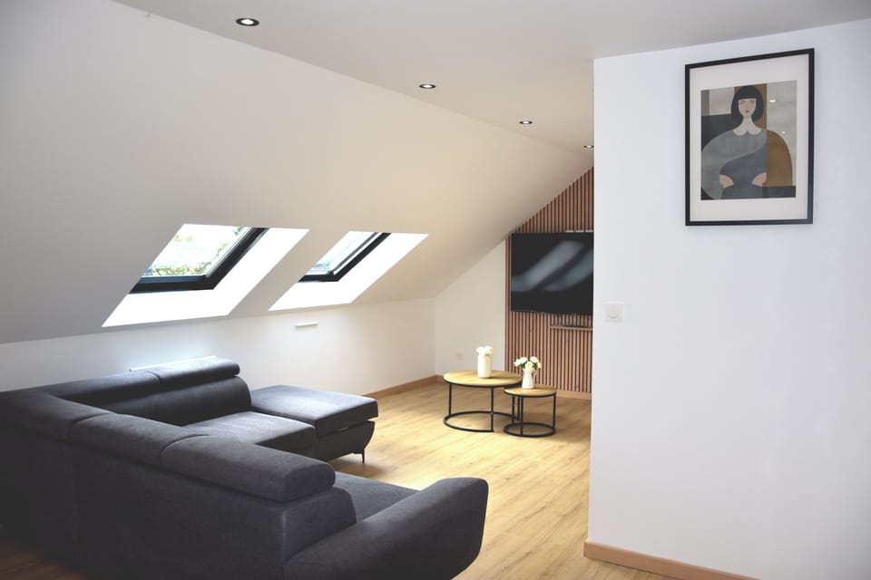 Deluxe Apartment | Living area | Flat-screen TV