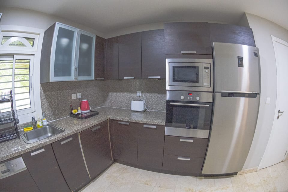 Luxury Villa, 4 Bedrooms | Private kitchen | Fridge, microwave, oven, dishwasher