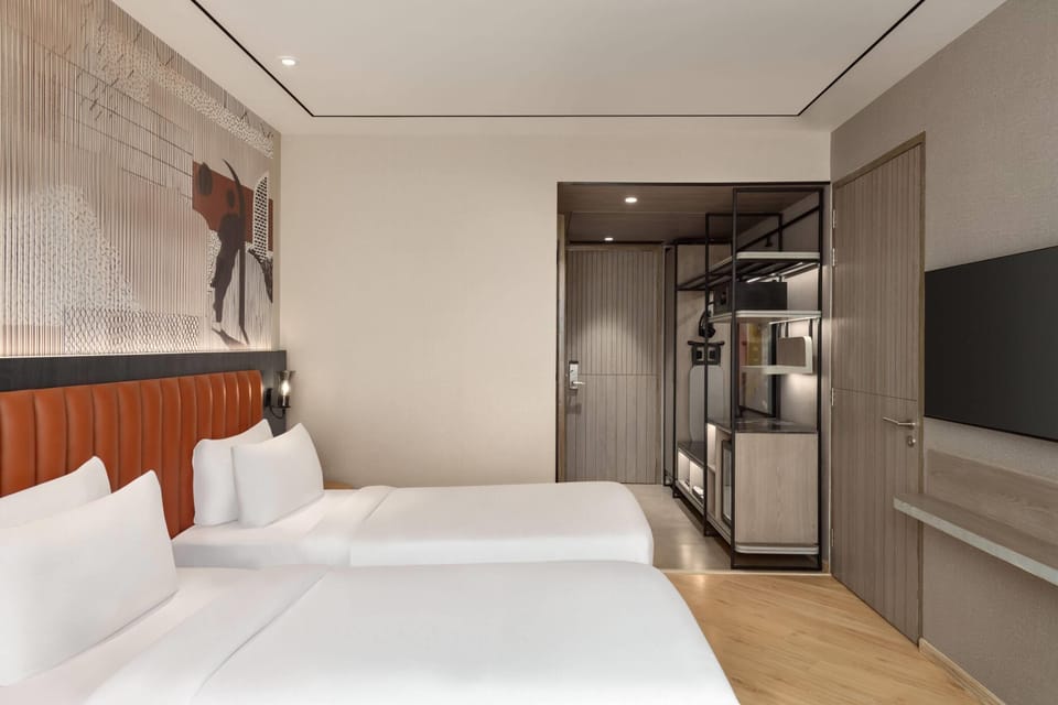 Executive Room, 2 Twin Beds, Non Smoking | Down comforters, minibar, in-room safe, desk