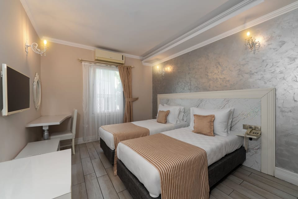 Deluxe Double or Twin Room, Garden View | Premium bedding, in-room safe, desk, free cribs/infant beds