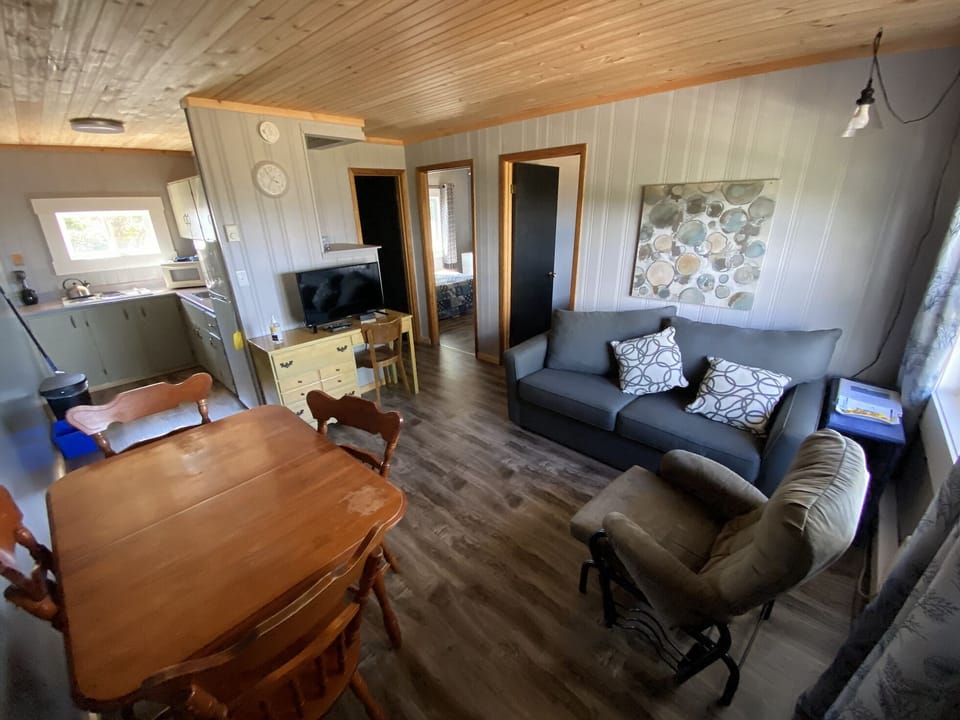 Cottage #2 Premium Cottage, 2 bedrooms | Living area | 32-inch flat-screen TV with cable channels, TV