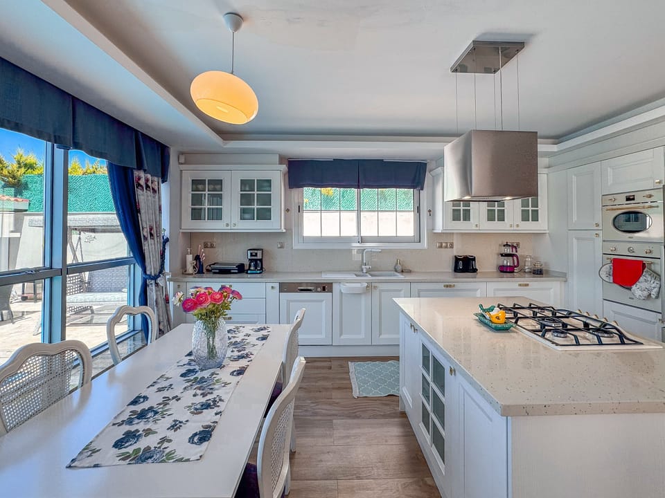 Deluxe Villa, Sea View | Private kitchen | Electric kettle, highchair
