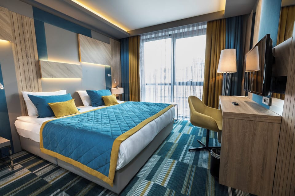Standard Double Room Single Use, City View | In-room safe, desk, laptop workspace, soundproofing