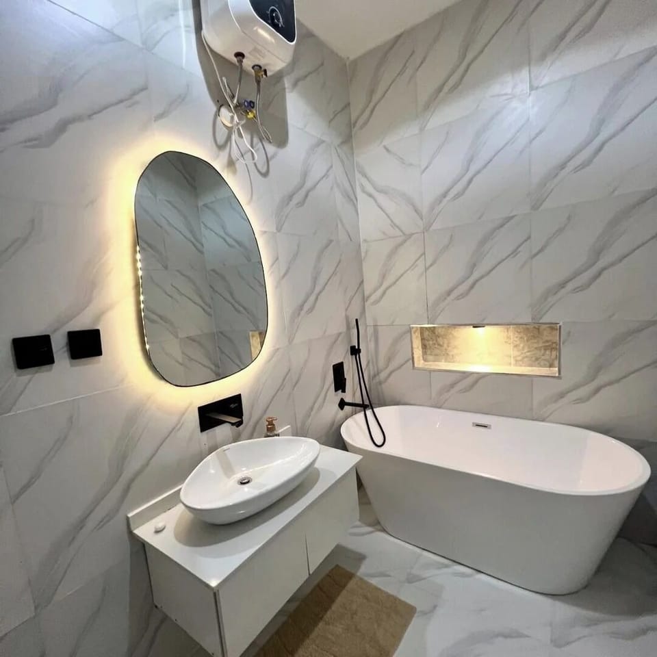 Family Room, Balcony, City View | Bathroom | Free toiletries, hair dryer, towels, soap